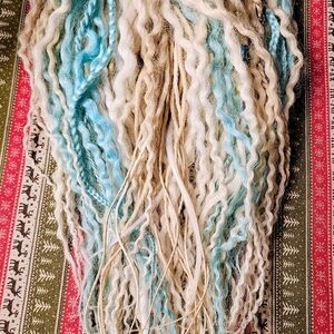 For Sale: 50 DE Synthetic blonde and turquoise locs adorned with braids